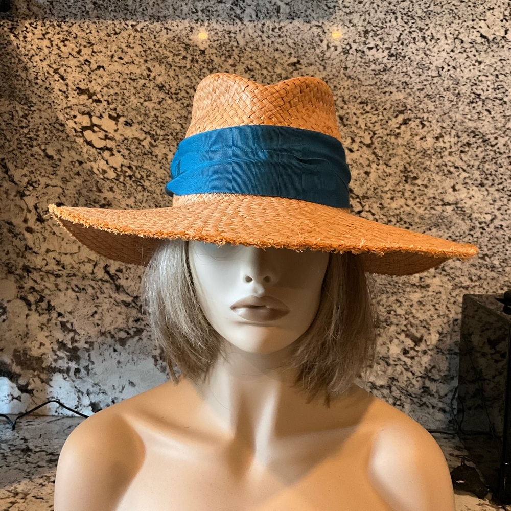 Stylish Tan Straw Hat with Blue Band and fluted back.